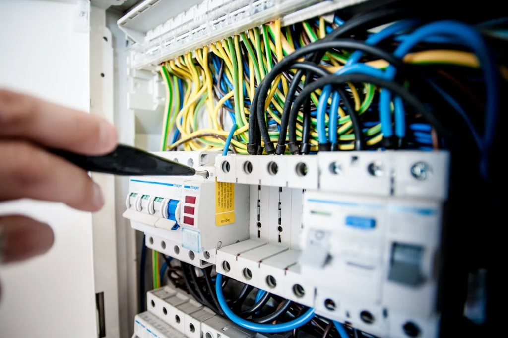 A mechatronics engineer performing a routine maintenance
